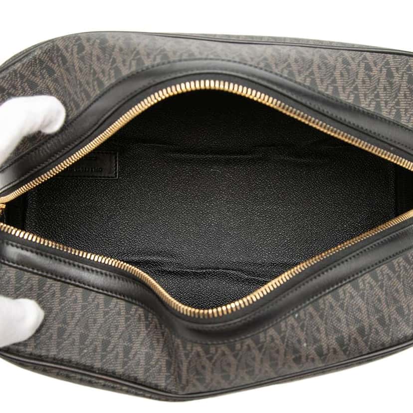 Saint Laurent Monogram Coated Canvas Cosmetic Pouch Brown Canvas Very good condition - Model View