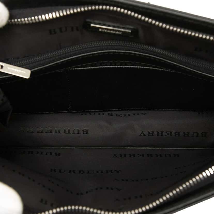 Burberry Leather Clutch Black Leather Very good condition - Model View