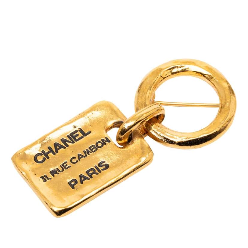 Chanel CC Gold Plated Rue Cambon Tag Brooch Gold Metal Very good condition - Front View