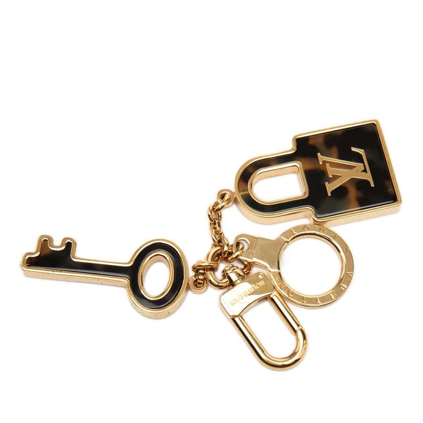 Louis Vuitton Gold Plated and Resin Confidence Bag Charm and Key Holder Gold Metal Very good condition - Inside View