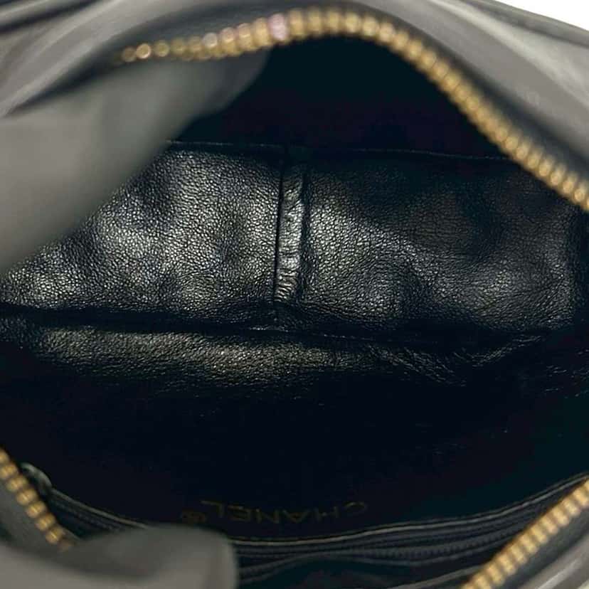 Chanel Small CC Quilted Lambskin Tassel Camera Bag Black Leather Very good condition - Inside View