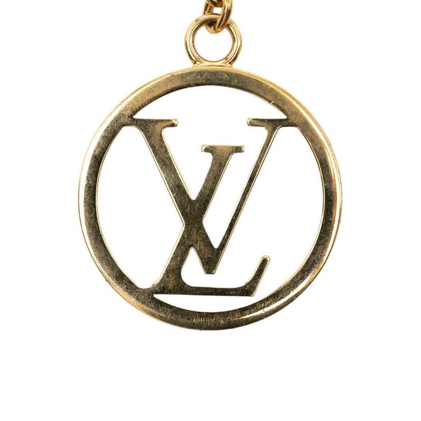 Louis Vuitton Gold Plated LV Circle Key Holder and Bag Charm Gold Metal Very good condition - Inside View