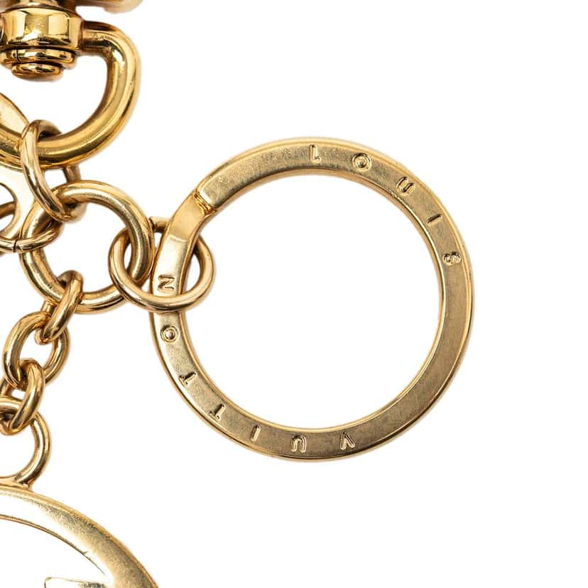 Louis Vuitton Gold Plated LV Circle Key Holder and Bag Charm Gold Metal Very good condition - Model View