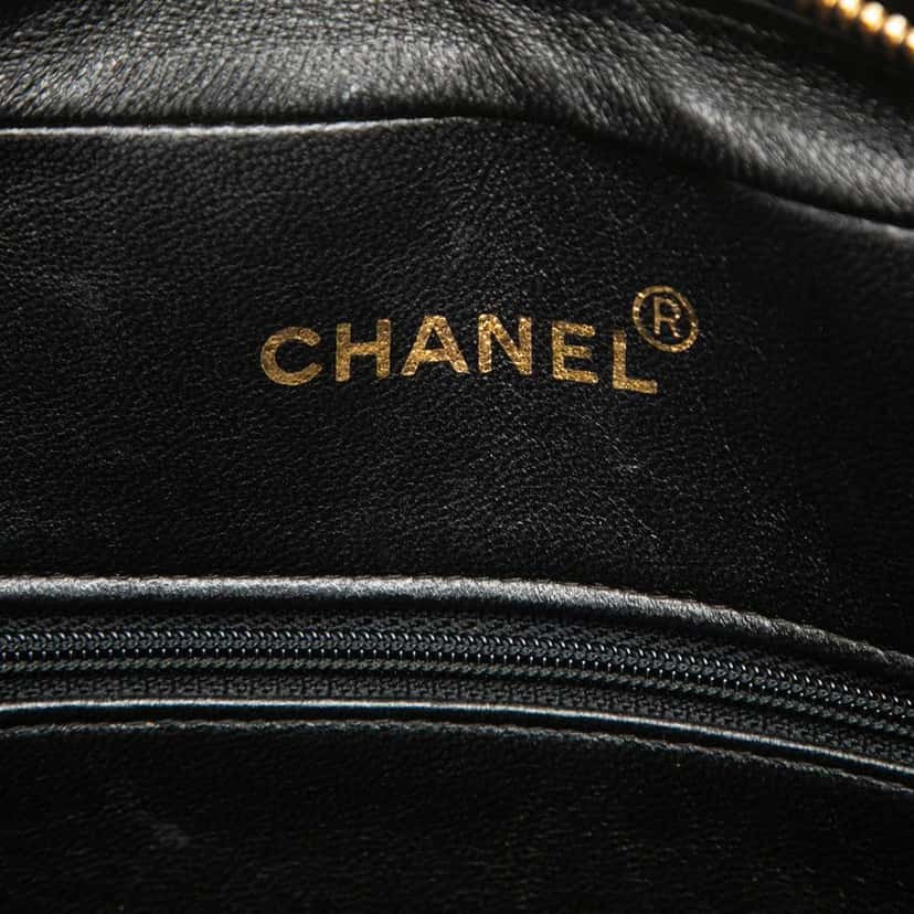 Chanel CC Vertical Quilted Lambskin Tassel Flap Camera Bag Black Leather Good condition - Box View