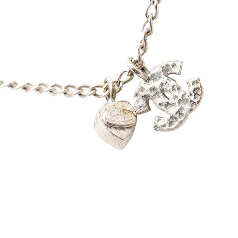 Chanel CC Brass and Strass Heart Pendant Necklace Silver Brass Very good condition - Model View