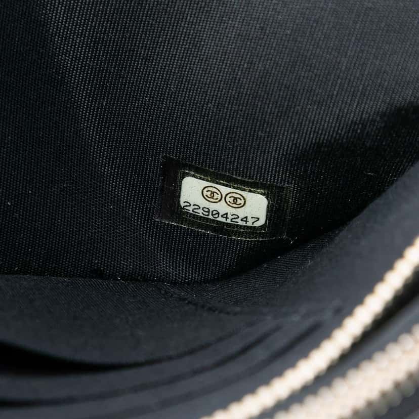 Chanel CC Studded Lambskin Double Zip Clutch with Chain Black Leather Very good condition - Box View