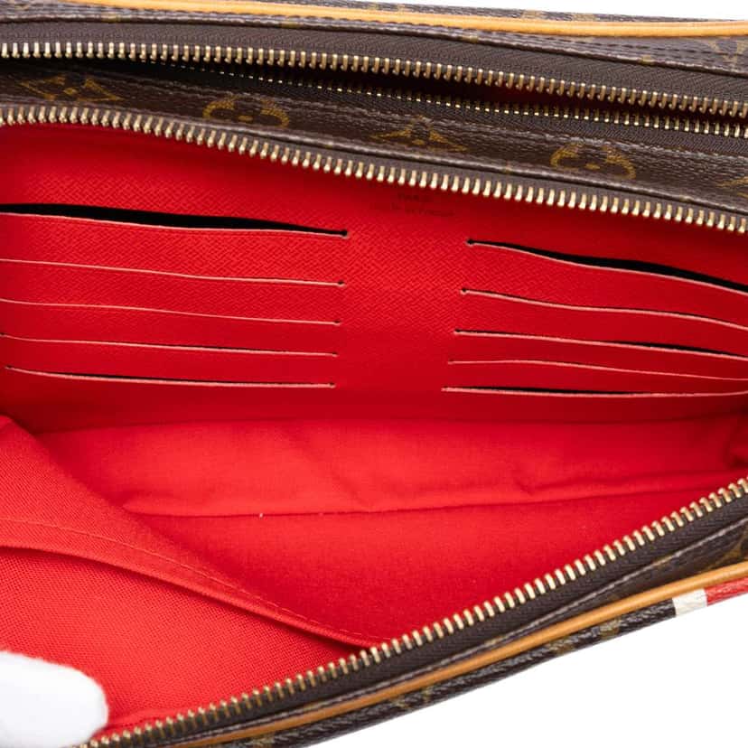 Louis Vuitton Monogram China Run Pavel Clutch Brown Very good condition - Model View