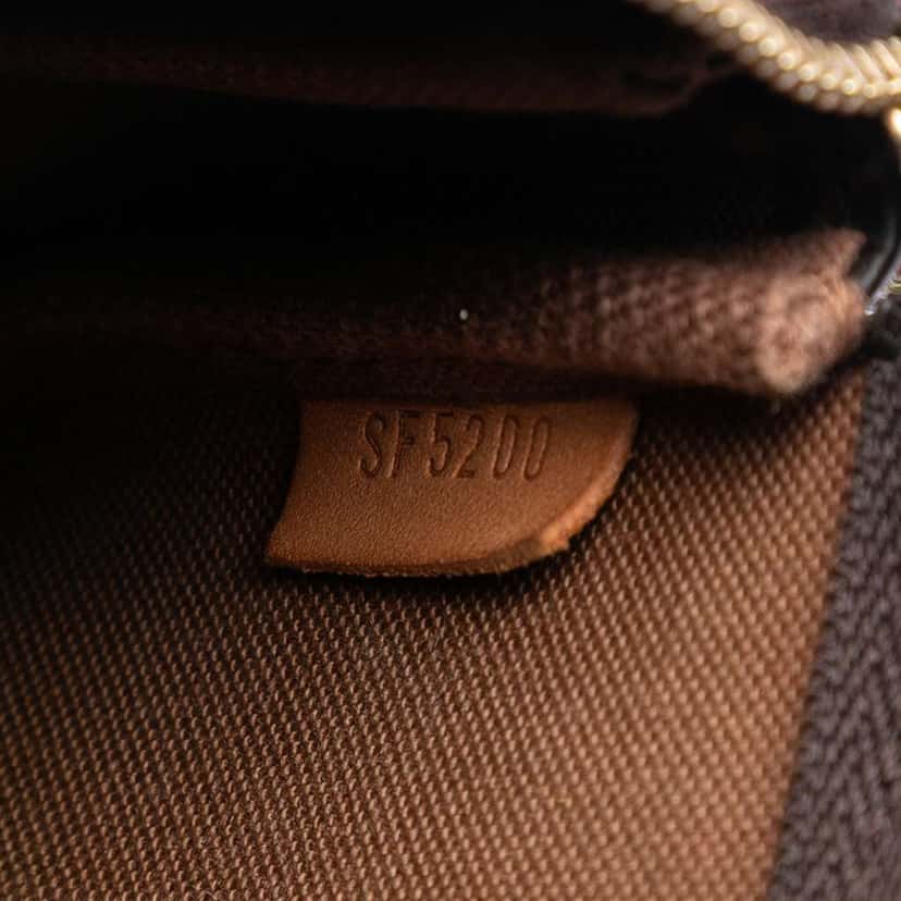 Louis Vuitton Monogram Mini Pochette Accessoires Brown Very good condition - Box View