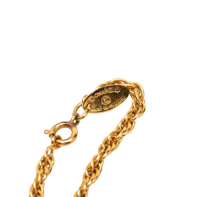 Chanel CC Gold Plated Sunburst Pendant Necklace Gold Metal Very good condition - Model View