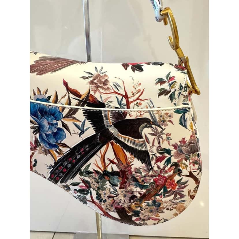 Dior Dior Rare Floral and Bird Print Leather Saddle Bag Gold Detailing Beige Leather Very good condition - Model View