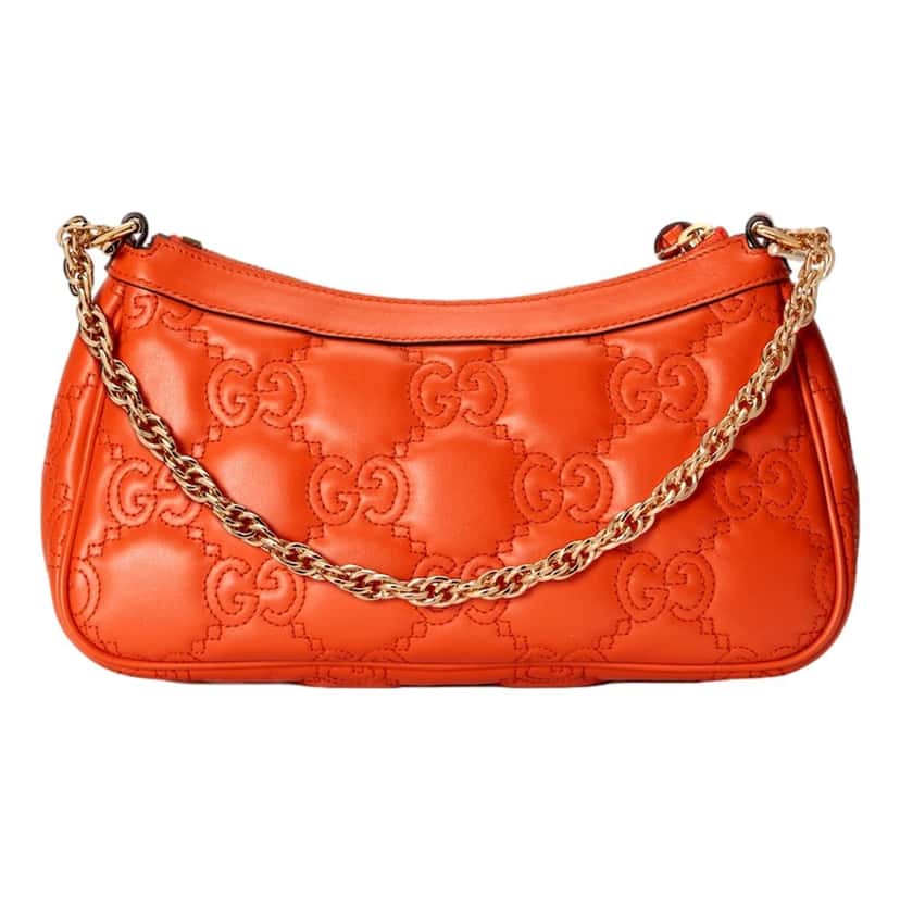 Gucci Gucci GG Quilted Matelass√© Leather Mini Shoulder Bag In Orange Orange Leather Never worn, with tag - Model View