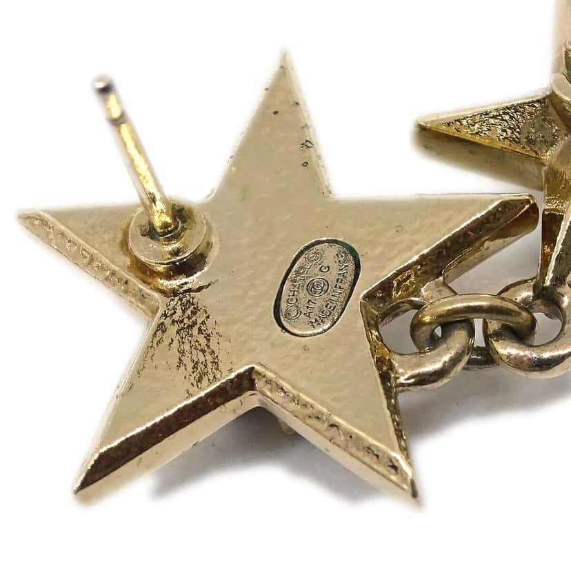Chanel CC Triple Star Drop Earrings Gold Good condition - Model View