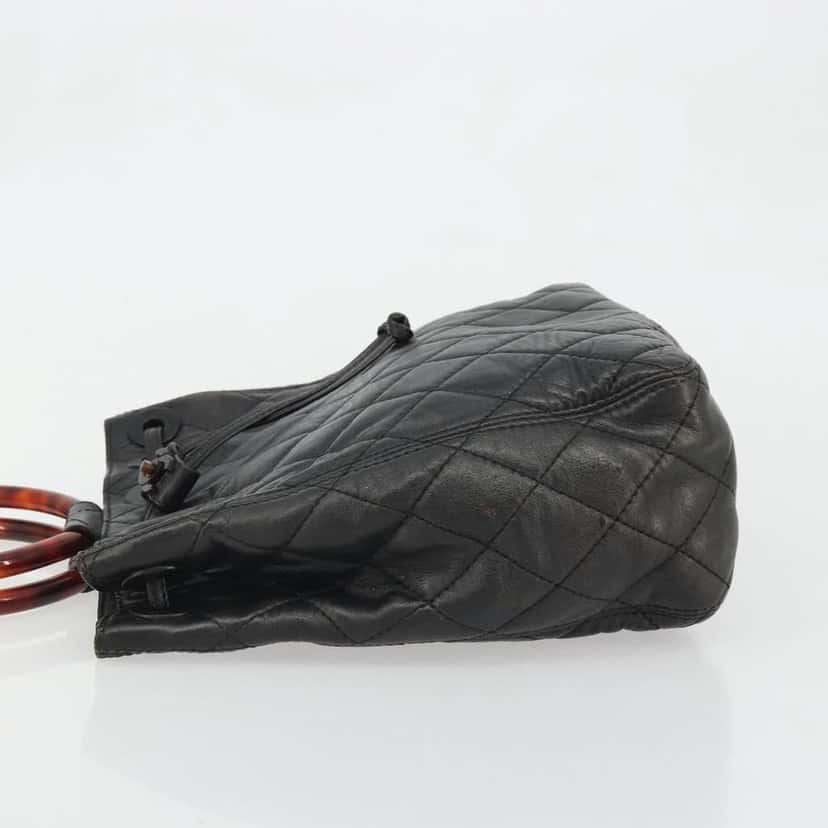 Chanel Vintage Resin Handle Drawstring Bucket Bag Black Leather Fair condition - Model View