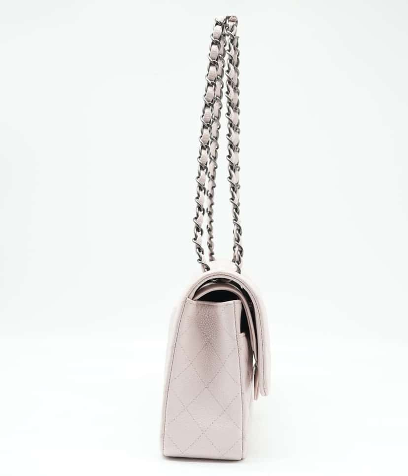 Chanel Classic Medium Flap Nude Caviar Leather Bag with Ruthenium Hardware Size 25 Beige Leather Good condition - Model View