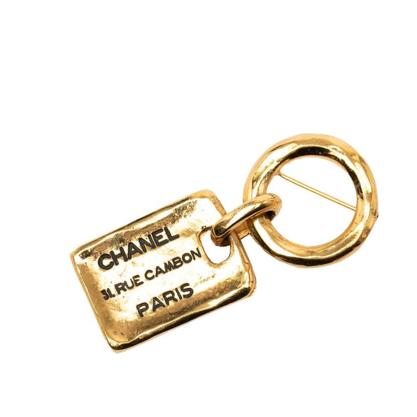 Chanel Gold Plated Rue Cambon Tag Brooch Gold Metal Very good condition - Front View