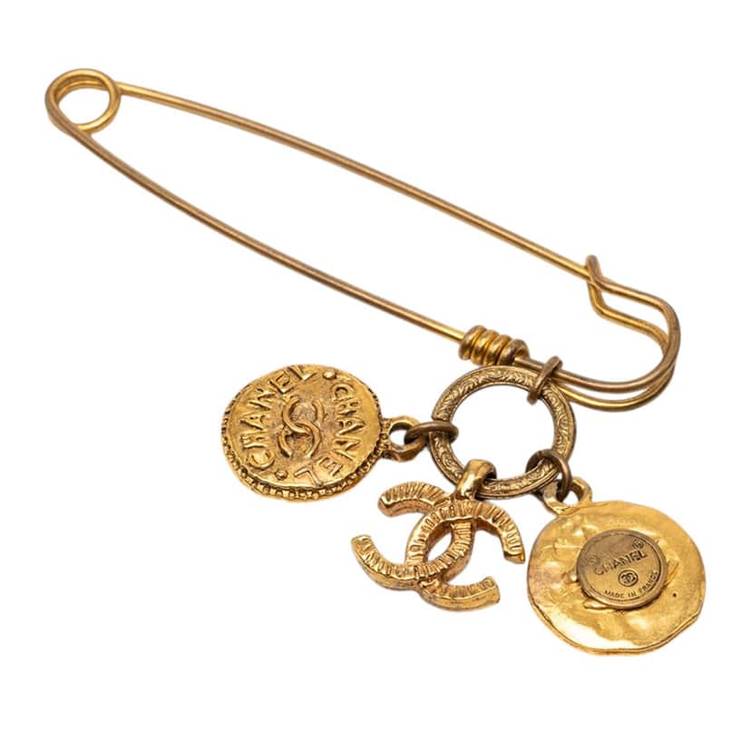 Chanel CC Gold Plated Medallion and Charms Safety Pin Brooch Gold Metal Very good condition - Front View