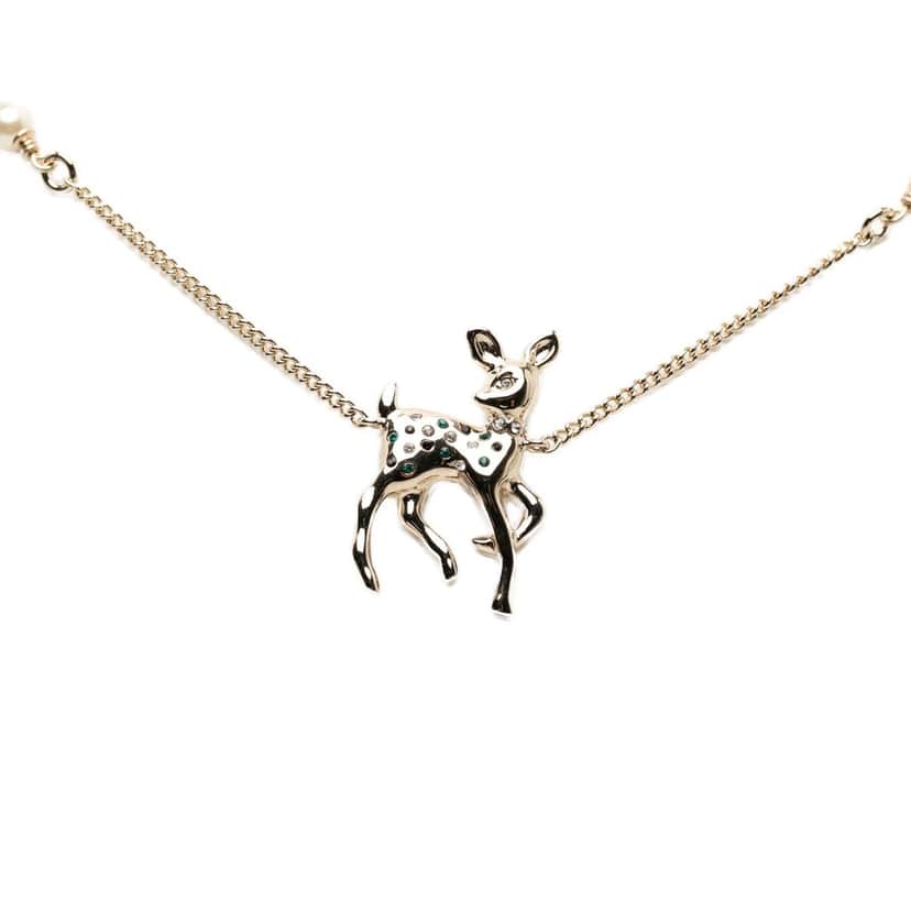 Chanel CC Gold Plated Faux Pearl and Strass Deer Pendant Necklace Gold Metal Very good condition - Front View