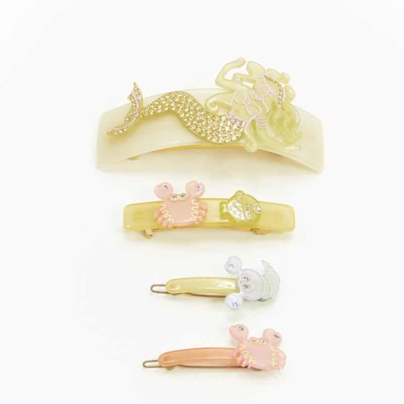 NON SIGNE / UNSIGNED Mermaid Hair Clips Yellow Plastic Very good condition - Front View