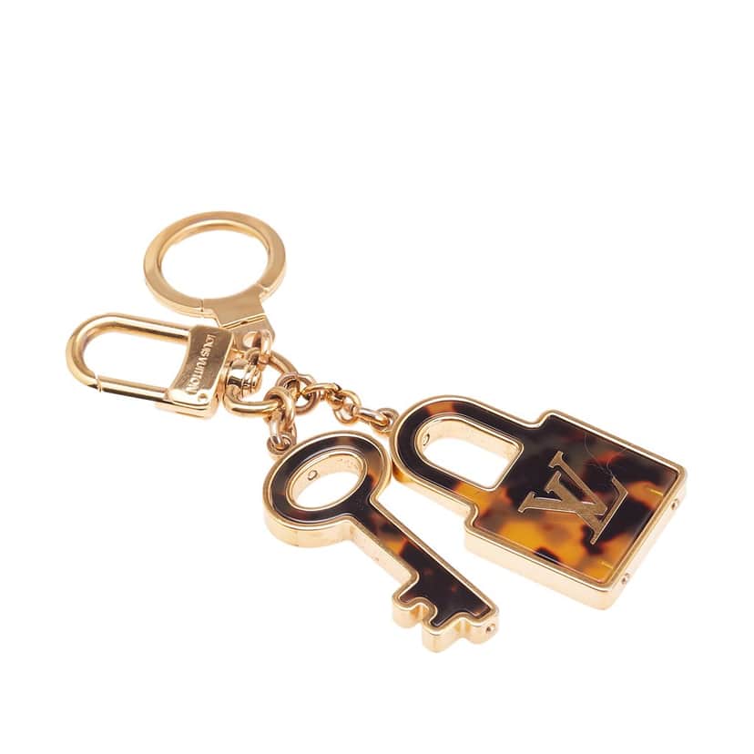 Louis Vuitton Gold Plated and Resin Confidence Bag Charm and Key Holder Gold Metal Good condition - Front View
