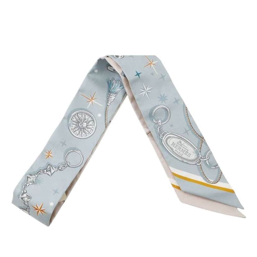 Hermès C est La Fete Silk Twilly Scarf Blue Silk Very good condition - Front View