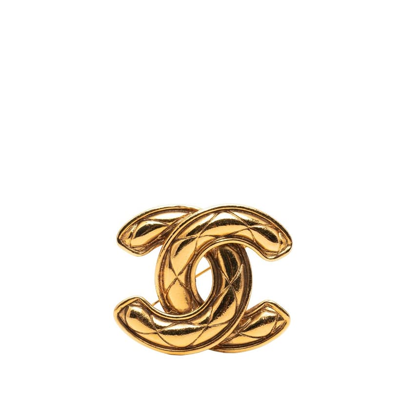 Chanel بروش مطلي بالذهب ومبطن بشعار CC