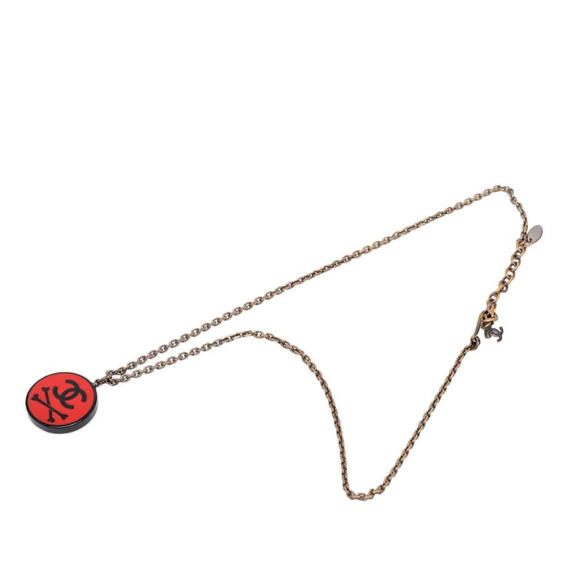 Chanel CC Gold Plated Resin Crossbones Round Pendant Necklace