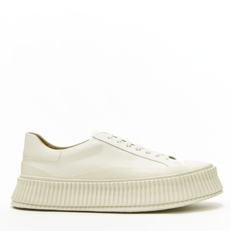 Jil Sander حذاء رياضي بيج اللون ذو نعل سميك