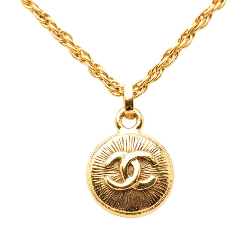 Chanel CC Gold Plated Sunburst Pendant Necklace
