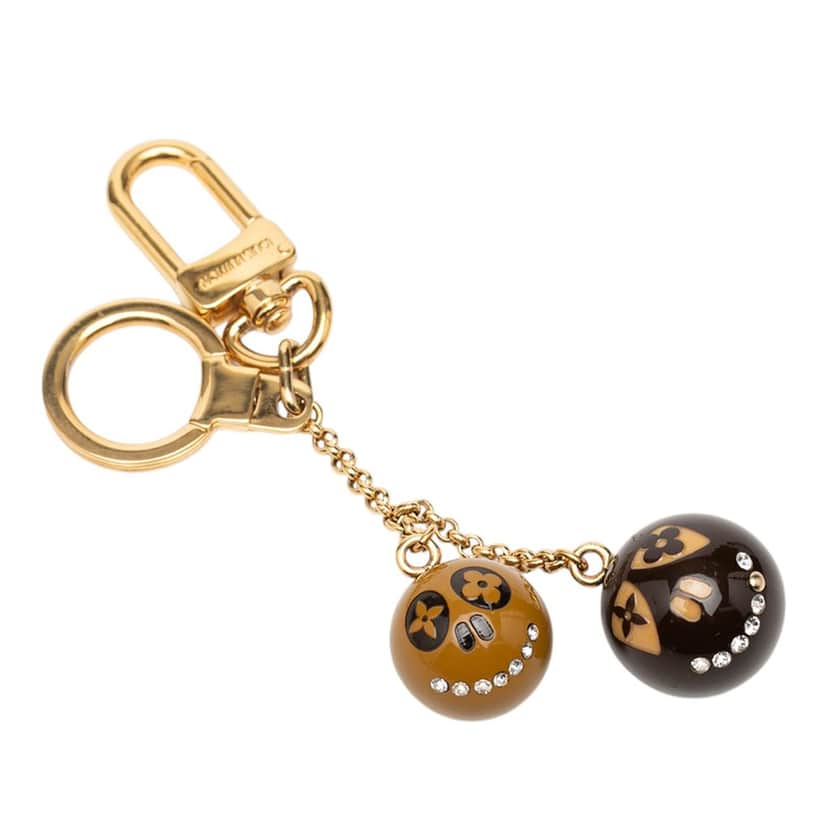 Louis Vuitton Gold Plated Strass and Resin Jack and Lucie Key Holder and Bag Charm Gold Metal Very good condition - Front View
