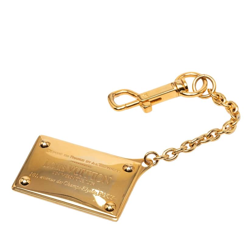 Louis Vuitton Gold Plated Inventeur Key Chain and Bag Charm Gold Metal Very good condition - Front View