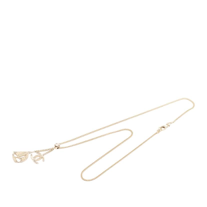 Chanel CC Gold Plated Sailboat Pendant Necklace Gold Metal Very good condition - Front View