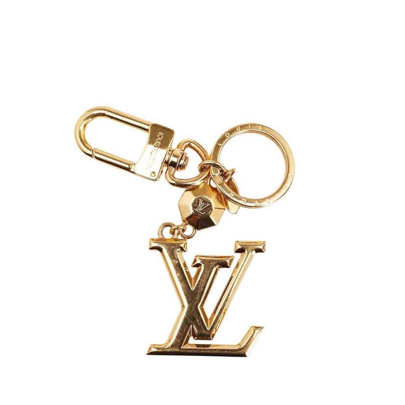 Louis Vuitton Gold Plated LV Facettes Bag Charm and Key Holder Gold Metal Good condition - Front View