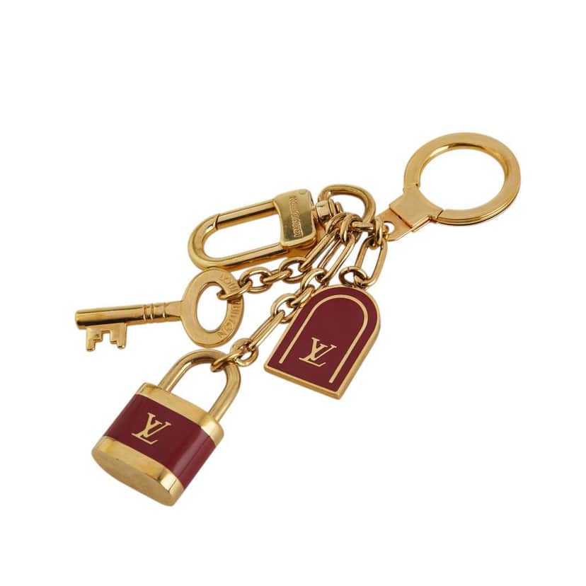 Louis Vuitton Gold Plated Porte Cles Cadenas Bag Charm and Key Holder Gold Metal Good condition - Front View