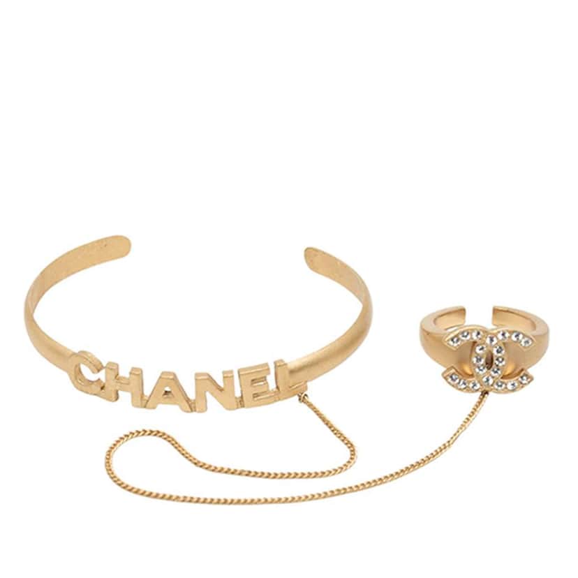 Chanel CC Gold Plated Rhinestone Logo Cuff Bracelet and Ring Set Gold Metal Very good condition - Front View