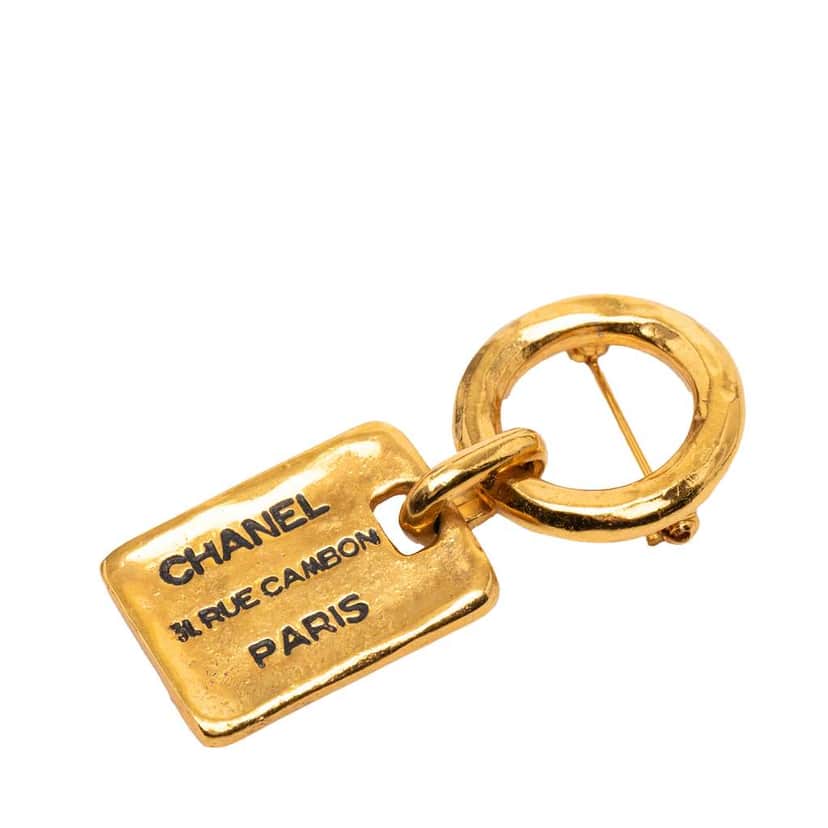 Chanel Gold Plated Rue Cambon Tag Brooch Gold Metal Very good condition - Front View