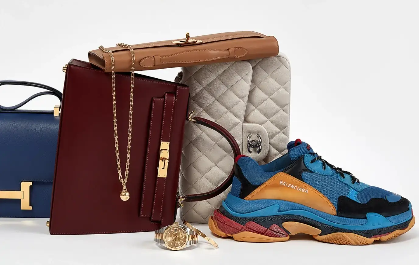 From left to right: Hermes bags, Chanel Classic flap, and Balenciaga triple S sneakers