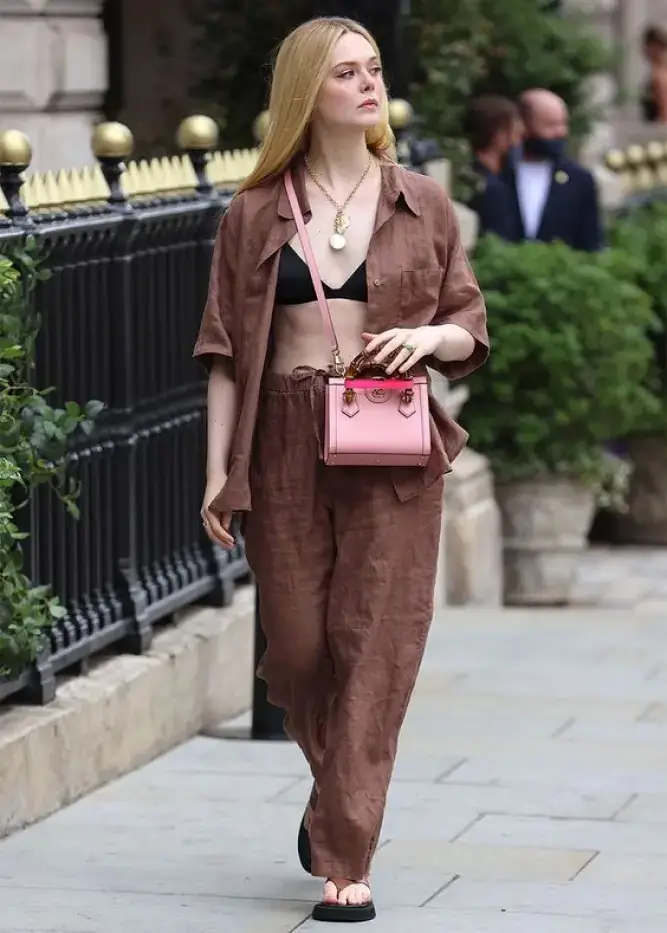 Elle Fanning on a casual outing rocking the Gucci Diana bag in a crossbody style.