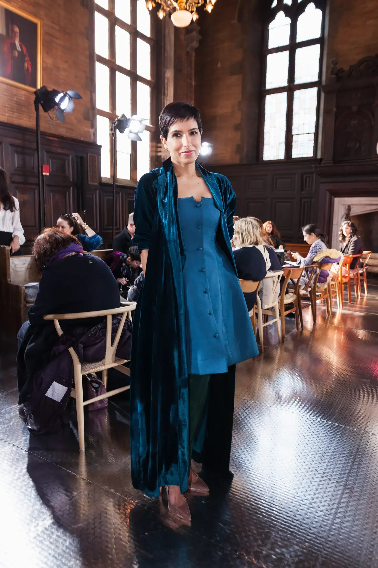 Princess Deena is slaying a luxurious, long duster coat