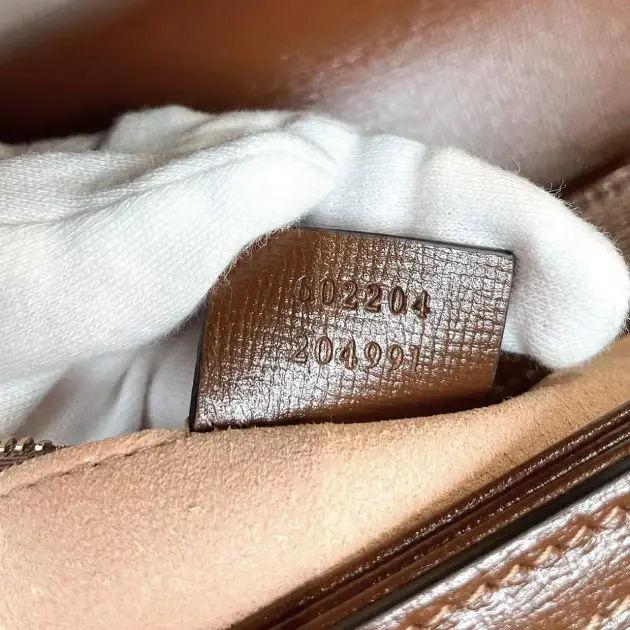 Gucci Horsebit Bag Fake VS Real Guide: The Serial Number. Real Gucci Horsebit with thin and small serial number font
