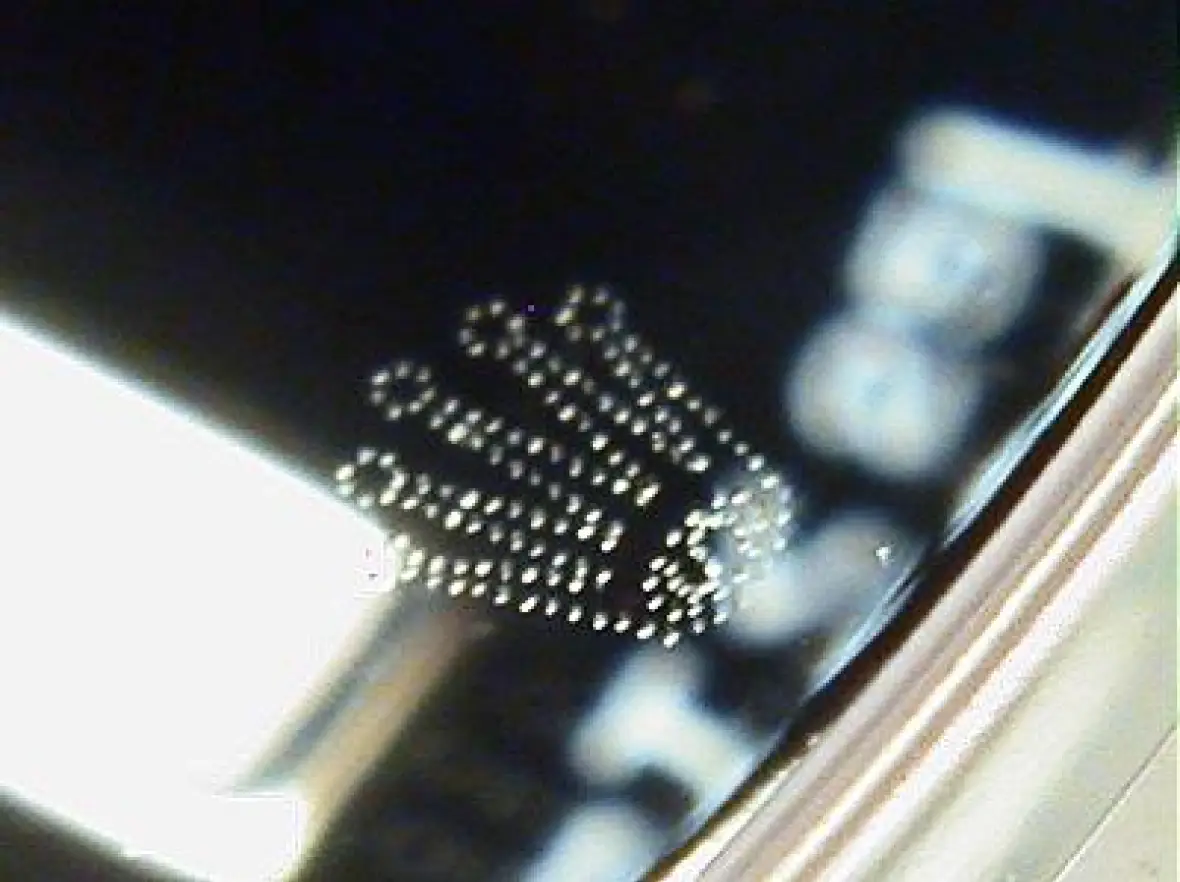 The laser-engraved crown logo on a Rolex