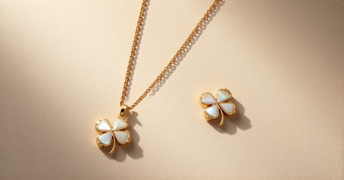 Van Cleef and Arpels Alhambra jewellery collection featuring gold and mother of pearl clover motif necklace and bracelet